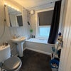 Photo 5: Clean and functional bathroom with bath and shower.