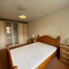 Photo 4: Master Bedroom with Built-in Wardrobes