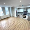 Photo 2: large open-plan living space 