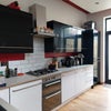 Photo 5: Kitchen with small yard to rear
