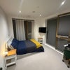 Photo 3: Room Picture - TV Included with full Shutter blinds