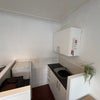Photo 3: The kitchenette has a sink, fridge freezer and microwave