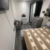 Photo 3: Spacious room with storage and TV