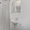 Photo 5: Ensuite bathroom (identical in both rooms)