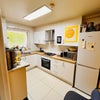 Photo 2: Bright kitchen