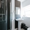 Photo 4: Room 3 - Large ensuite shower room with window for natural light