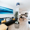 Photo 9: Living area with Large TV