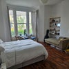 Photo 2: Huge bedroom with desk and keyboard.