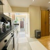 Photo 8: Kitchen plus living room 
