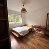 Photo 1: Big bedroom (weird lense though!)