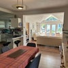 Photo 2: Shared living and dining area