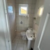 Photo 9: Toilet and wash basin 
