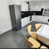 Photo 5: Kitchen And Dining Area