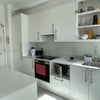 Photo 2: Kitchen with washing machine