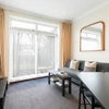 Photo 1: Living Room through to the garden