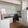 Photo 7: Kitchen with washer, dishwasher, toaster, fridge 