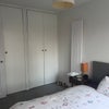 Photo 2: Double room view of storage cupboards