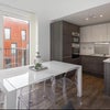 Photo 4: Living room/kitchen with balcony