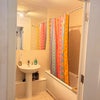 Photo 4: Clean modern bathroom, shower and bath