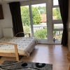 Photo 2: studio- view to patio doors