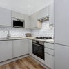 Photo 6: Kitchen shared with two other people 
