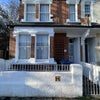 Photo 7: Front of Property