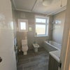 Photo 14: FIRST FLOOR BATHROOM
