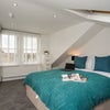 Photo 10:  Bedroom 5 w/ en-suite - Taken