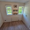 Photo 2: single fits in nicely in the corner with a side desk or can squeeze in a double if prefered.