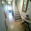 Photo 6: Large and welcoming entrance leading to the ... 