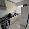 Photo 6: Side view of kitchen