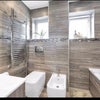 Photo 2: Bathroom and shower 