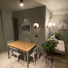 Photo 2: Sitting / Dining Area
