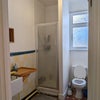 Photo 7: Downstairs shower/toilet