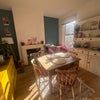 Photo 3: The dinibg room, has a lovely seat by window to chill too