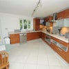 Photo 7: Kitchen with patio access