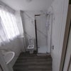 Photo 6: Shower Downstairs