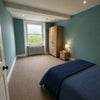 Photo 7: Blue Bedroom AVAILABLE