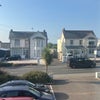 Photo 5: The street view from the flat - small sea view!