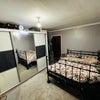 Photo 1: Room 1 King Bed