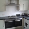 Photo 16: Kitchen area