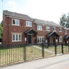 Photo 2: front of Property
