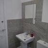 Photo 17: There is a separate utility room with Washing Machine, Tumble Dryer plus toilet and sink