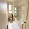 Photo 4: Bathroom with shower bath