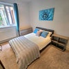 Photo 2: Furnishings include a double bed/mattress, wardrobe, chest of draws, bedside table, desk and chair.
