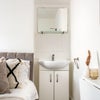 Photo 5: Basin with storage and mirror 