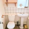 Photo 3: Shared Toilet 