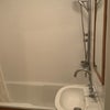 Photo 9: Metal bath with shower 