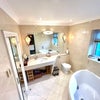 Photo 5: BATHROOM; Mega-Bath & 12" Shower head
