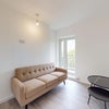 Photo 5: Lounge room